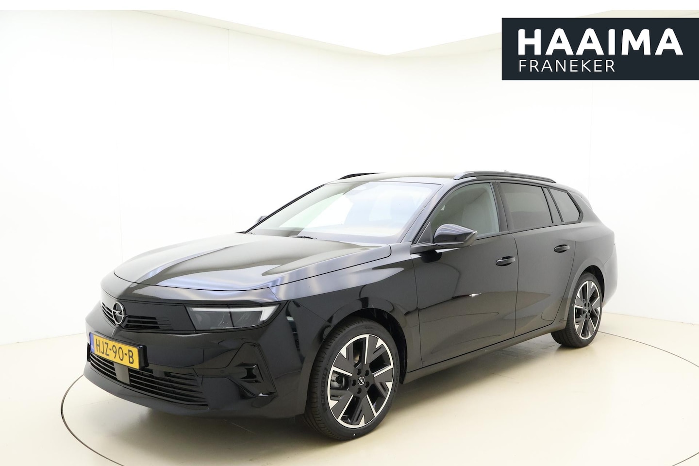 Opel Astra Electric - 54 kWh Business Edition | Navigatie | Stoelverwarming | AGR stoel | Stuurverwarming | Lich - AutoWereld.nl