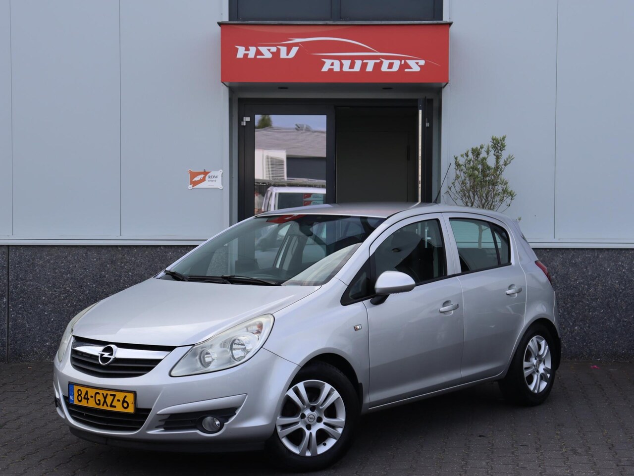 Opel Corsa - 1.2-16V Enjoy airco LM 4-deurs - AutoWereld.nl