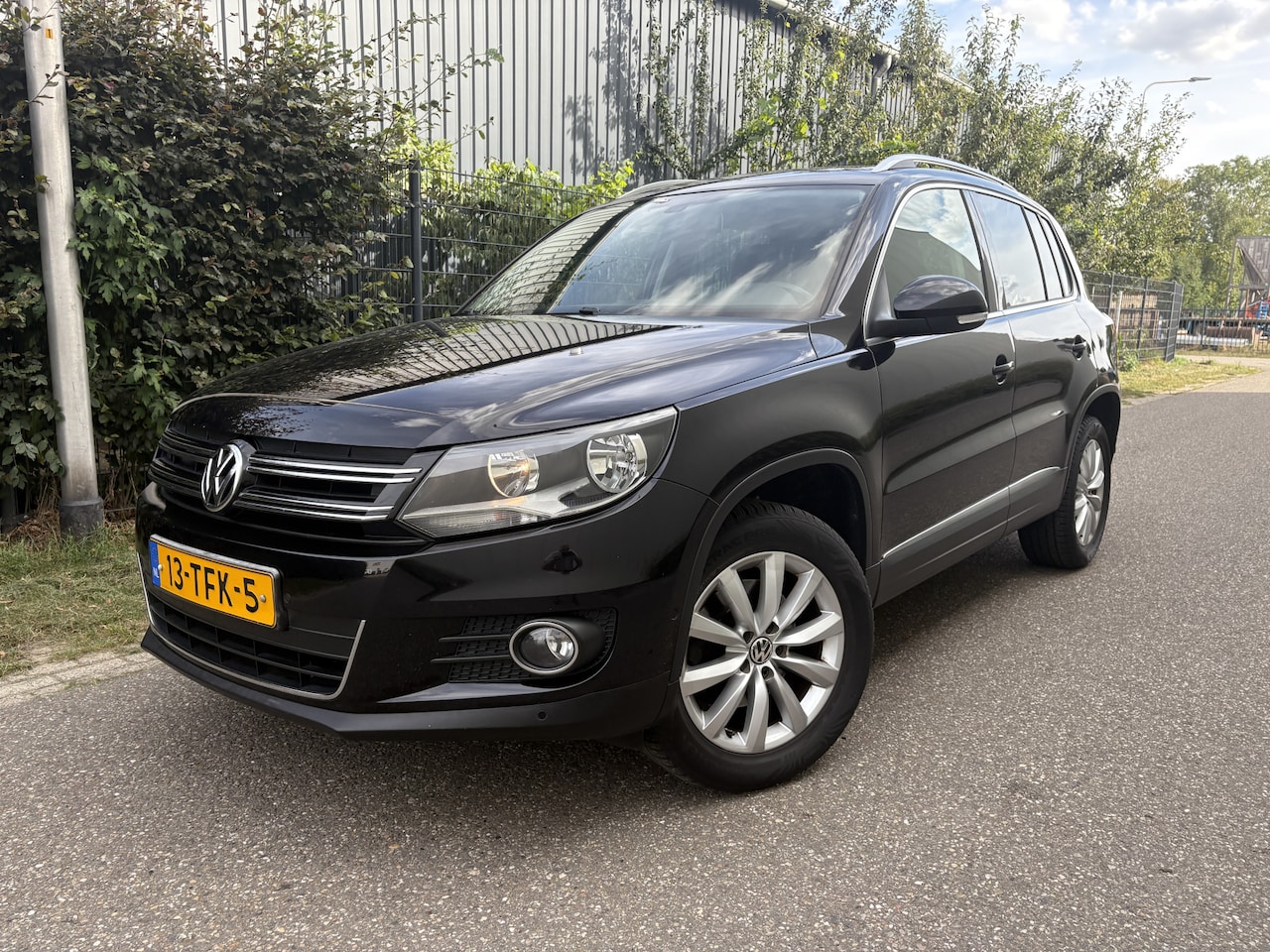 Volkswagen Tiguan - 1.4 TSI Sport&Style / AIRCO / NAVI / CRUISE - AutoWereld.nl