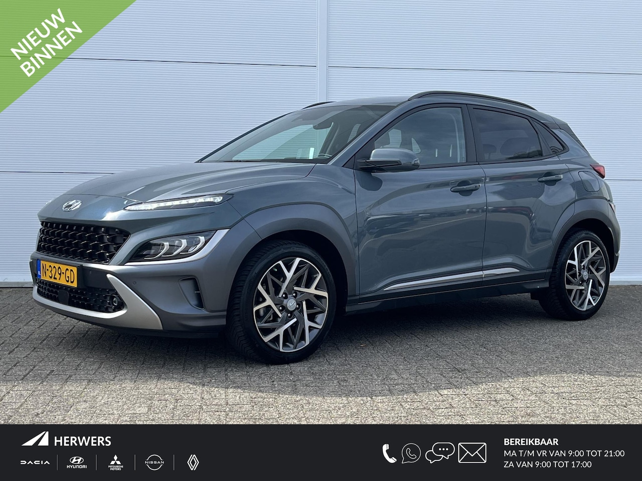 Hyundai Kona - 1.6 GDI HEV Premium /cruise control adaptief met Stop&Go/ voorstoelen verwarmd/ Apple Carp - AutoWereld.nl