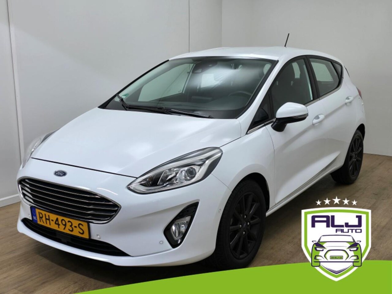 Ford Fiesta - Occasion luxe Titanium met zwarte velgen en parkeercamera | Bomvolle auto! | Tweedehands F - AutoWereld.nl