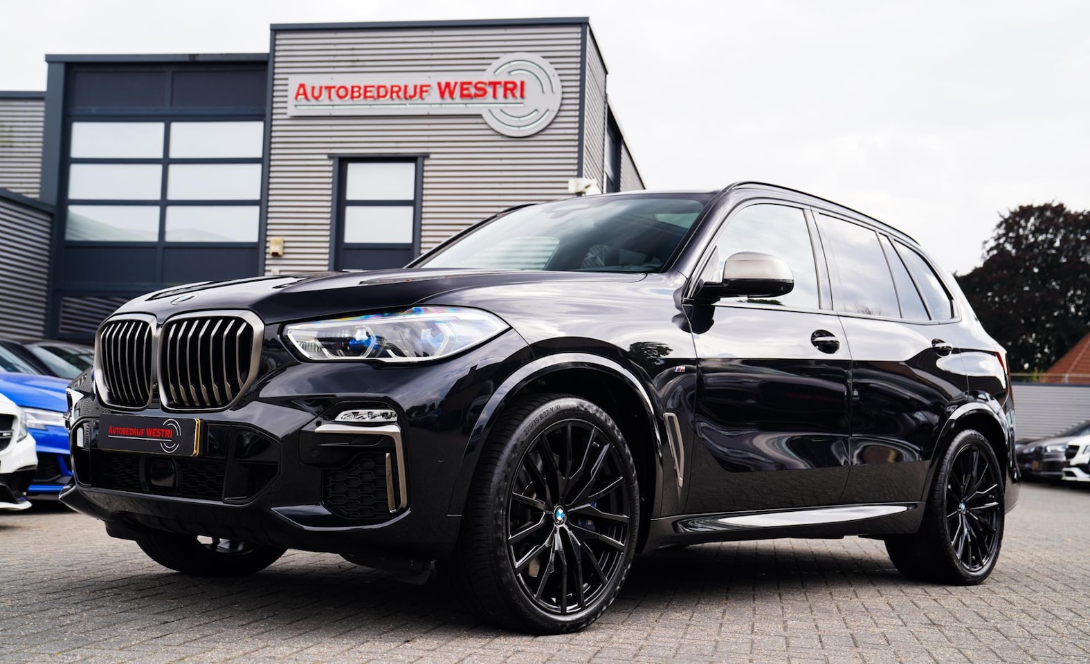 BMW X5 - M50i High Executive | Elektrisch trekhaak | Headup | 360 Camera - AutoWereld.nl