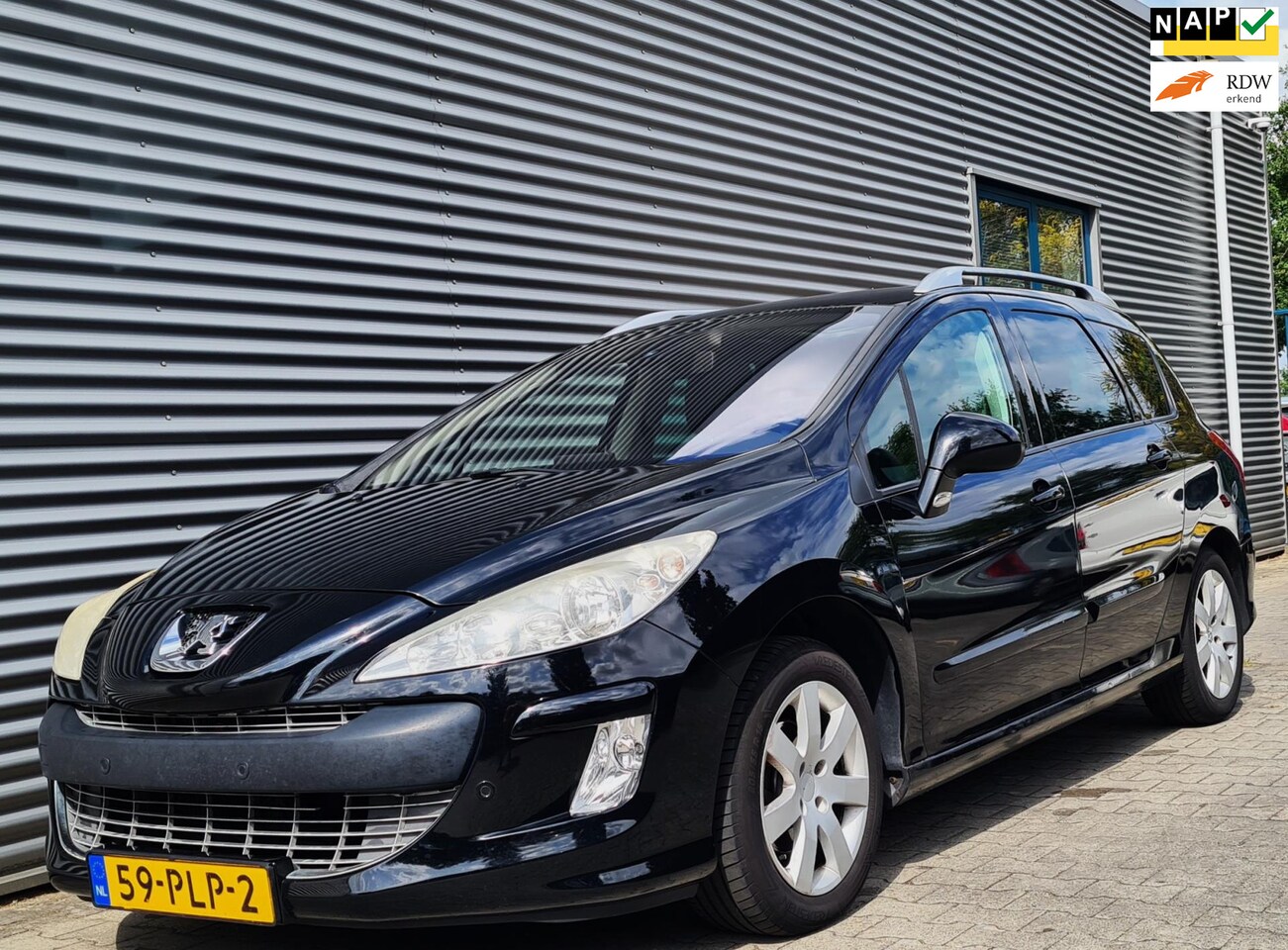 Peugeot 308 SW - 1.6 HDiF Blue Lease Executive 03-2011 Zwart Metallic - AutoWereld.nl