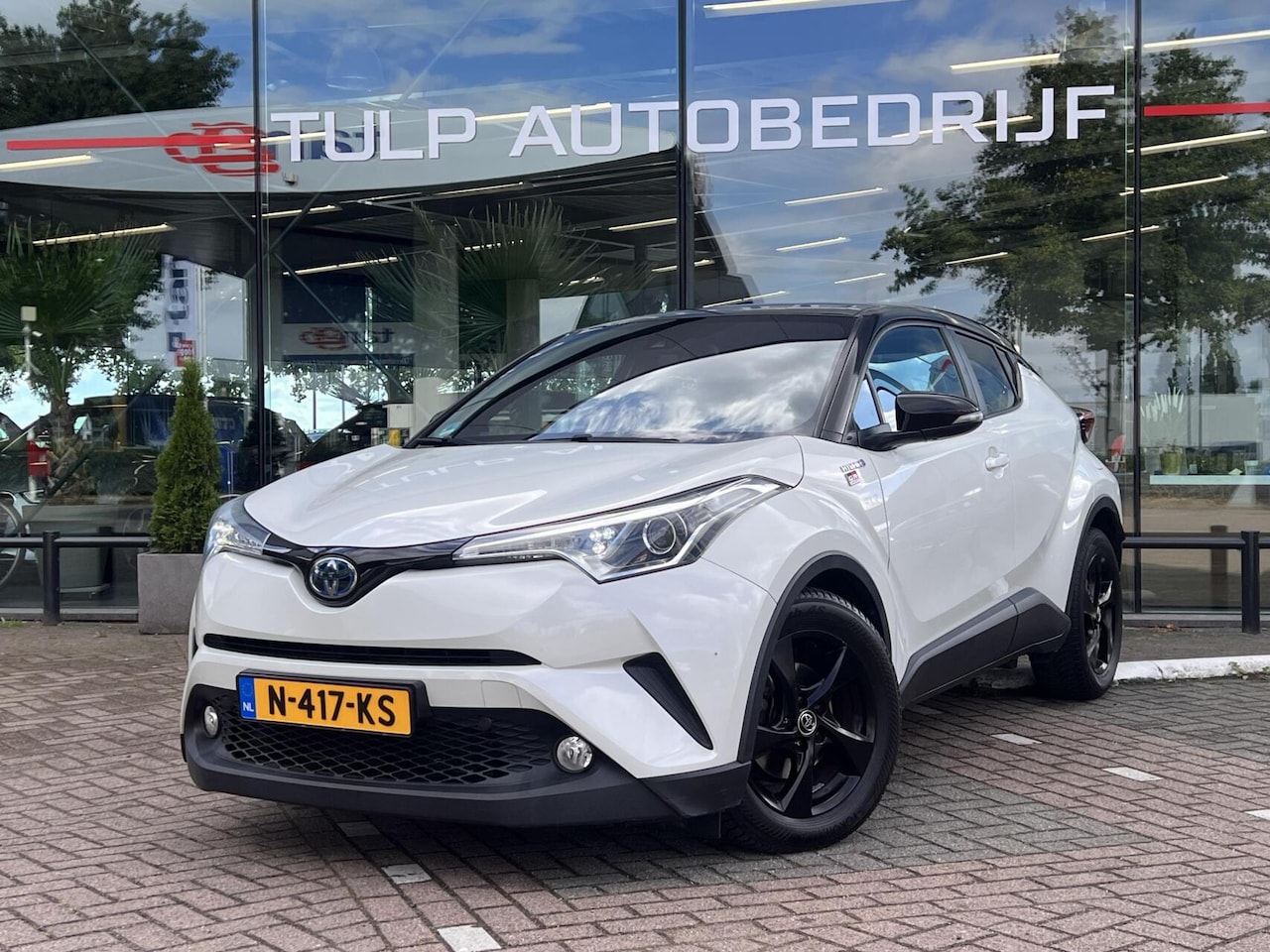 Toyota C-HR - 1.8 Hybrid Active Two-Tone Parelmoer Trekhaak - AutoWereld.nl