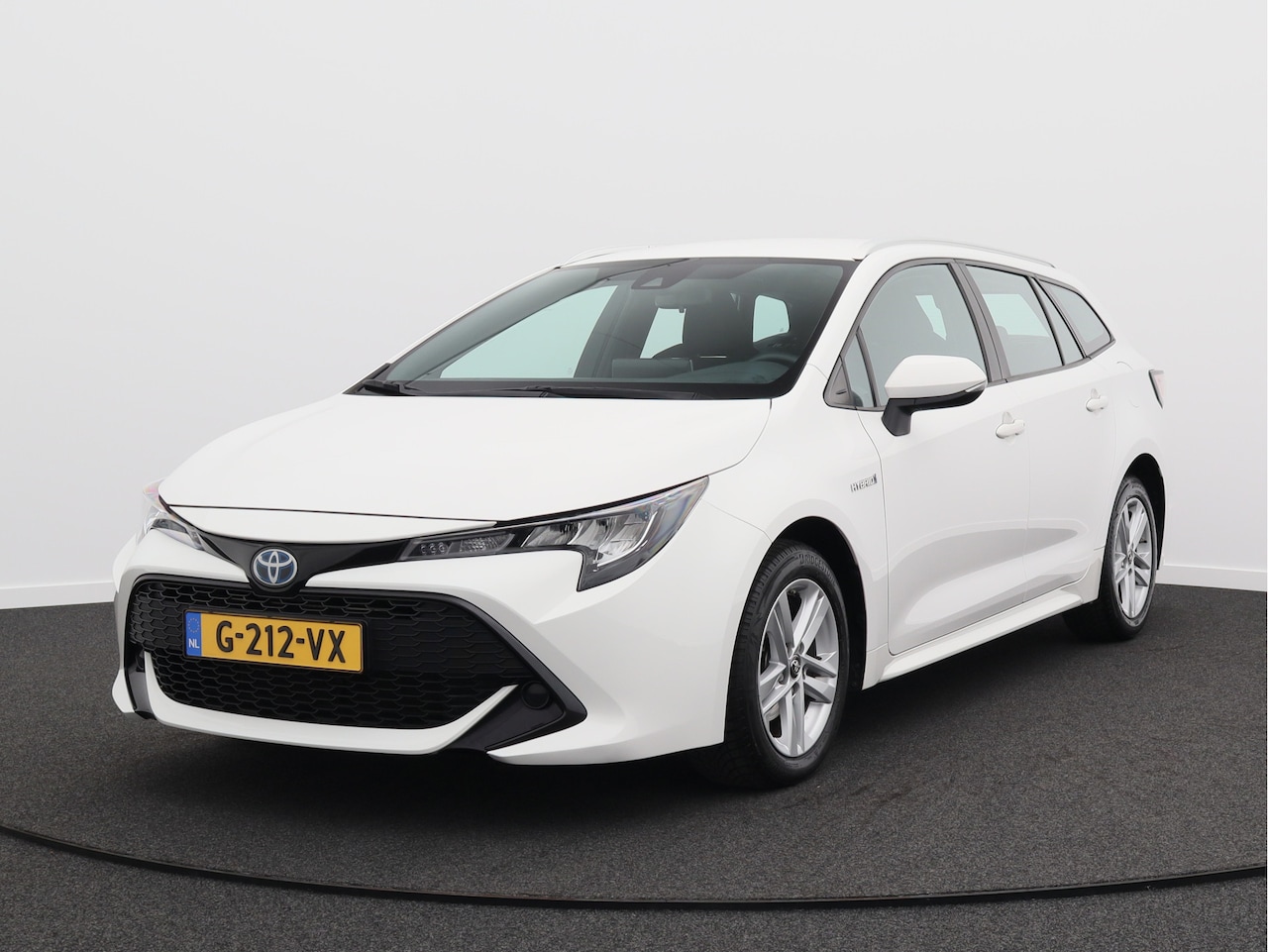 Toyota Corolla Touring Sports - 1.8 Hybrid Business/ lage km/ zeer mooi! - AutoWereld.nl