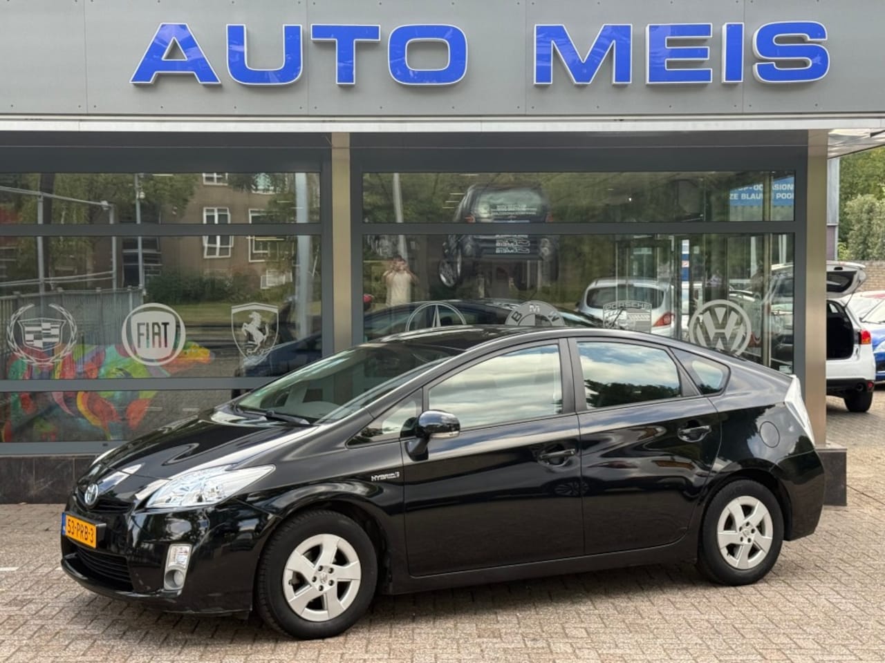Toyota Prius - 1.8 Aspiration Navi Clima Cruise - AutoWereld.nl