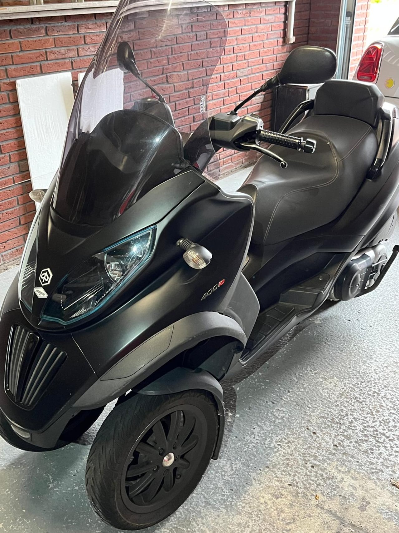 Piaggio MP3 - M64 - AutoWereld.nl