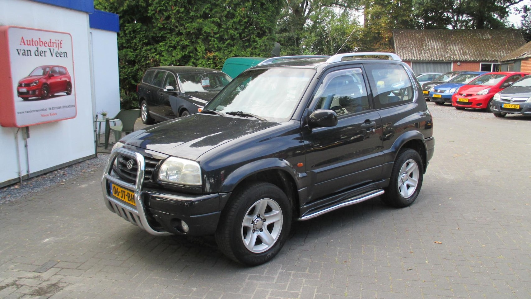 Suzuki Grand Vitara - 2.0 Metal Top Wide Body 2.0 Metal Top Wide Body - AutoWereld.nl