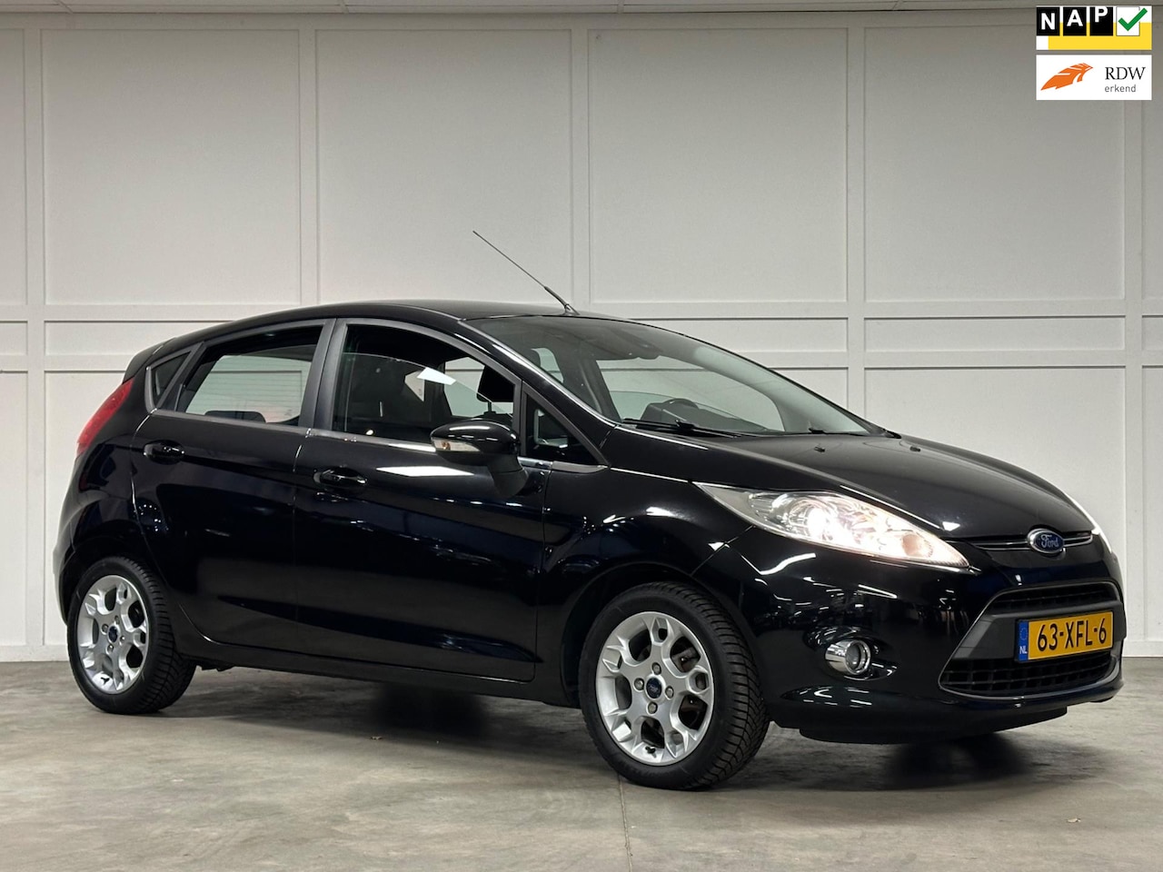 Ford Fiesta - 1.25 Titanium / Navi / Airco / Camera / 2012 - AutoWereld.nl