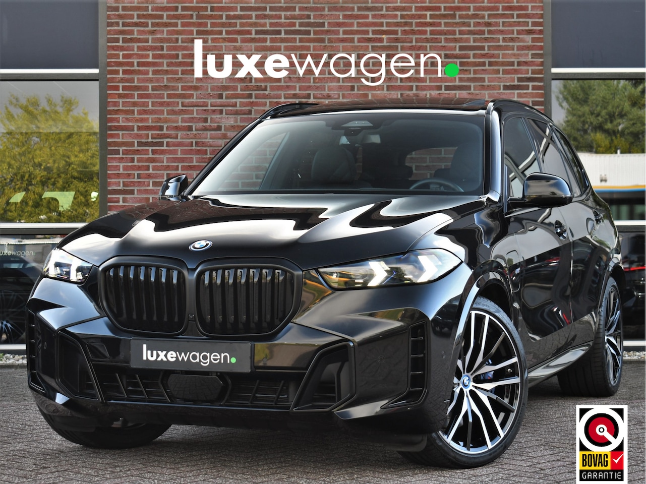BMW X5 - xDrive50e M-Sport Pro Pano Comf-zetels H/K HUD 360 22-inch - AutoWereld.nl