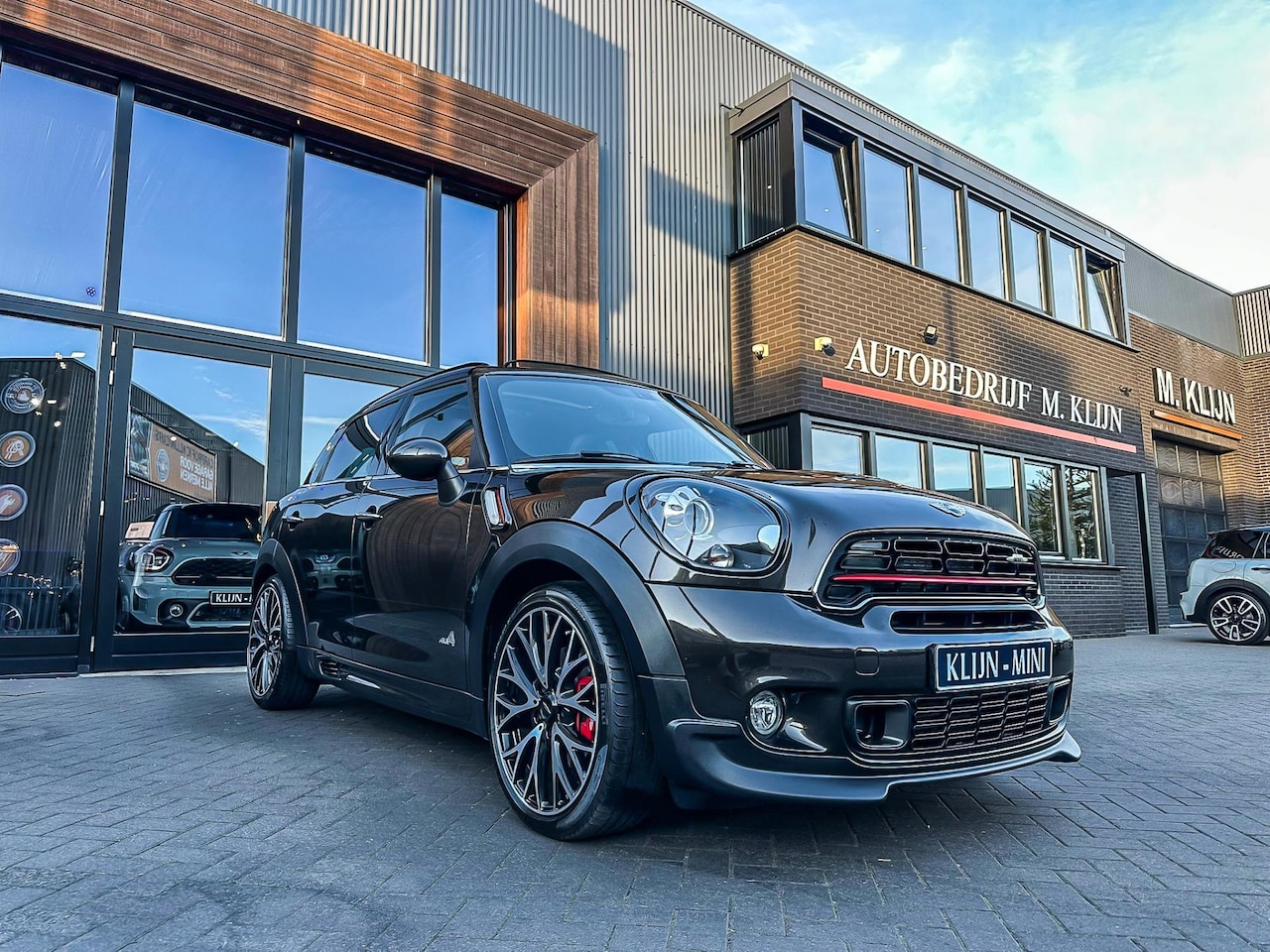 MINI Countryman - Mini 1.6 John Cooper Works ALL4 F1 aut 218p Midnight grey/Pano/np.61.000/Vol - AutoWereld.nl