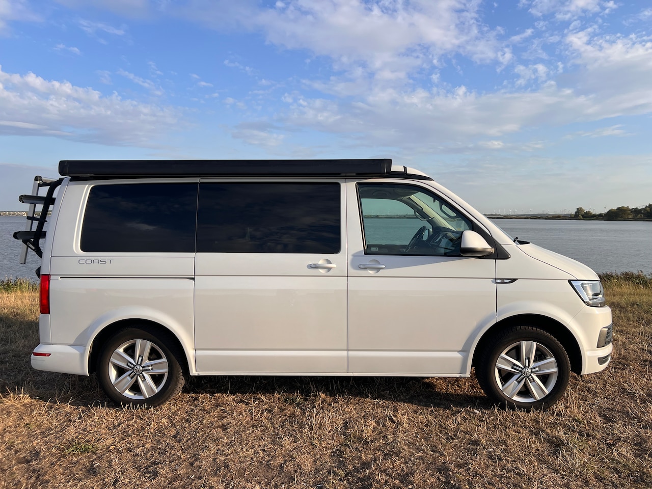 Volkswagen Transporter California - Volkswagen California 2.0 TDI – 204pk – Onyx White parelmoer (85.000 km, Euro 6) - AutoWereld.nl