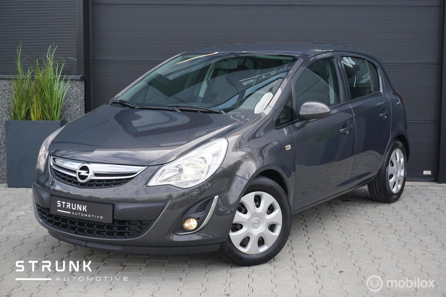 Opel Corsa - 1.2-16V Berlin Airco Navi Cruise Centrale vergr - AutoWereld.nl