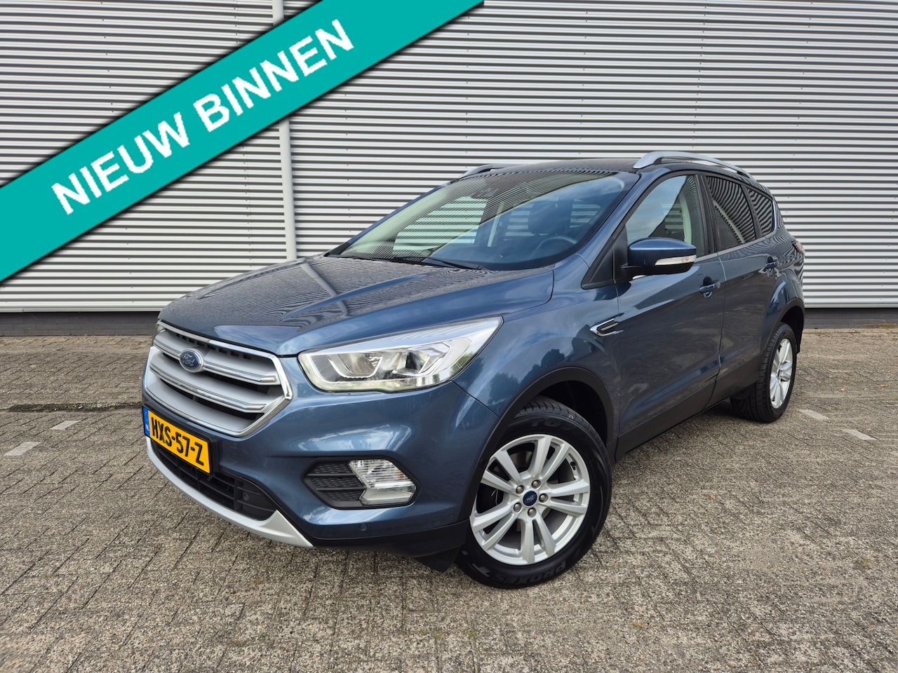 Ford Kuga - 1.5 EcoBoost Titanium 1.5 EcoBoost Titanium ,airco,cruise,applecarplay/android,navigatie/camera,parkeersensoren, - AutoWereld.nl