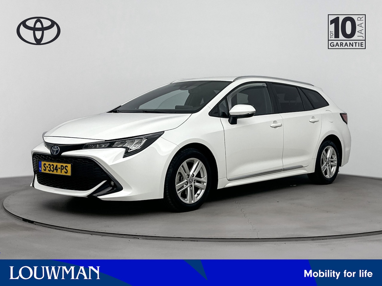 Toyota Corolla Touring Sports - 1.8 Hybrid Active Limited | Apple Carplay -/ Android Auto | Parkeercamera | Cruise Control - AutoWereld.nl