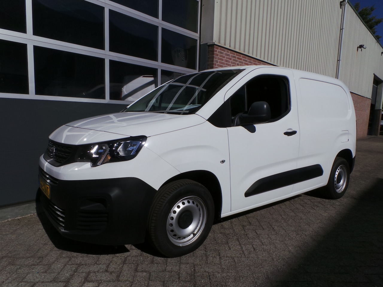 Peugeot Partner - 1.6 BlueHDI Pro Schuifdeur Airco,Cruise,El ramen - AutoWereld.nl