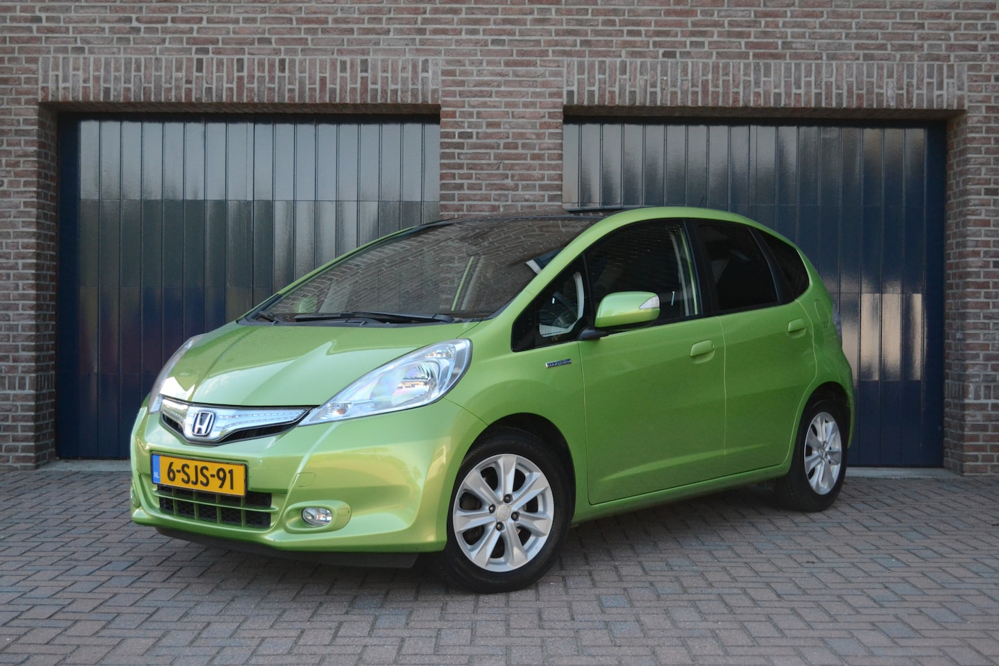 Honda Jazz - 1.4 Hybrid Automaat Elegance | Panoramadak | Clima | Cruise | Navigatie - AutoWereld.nl