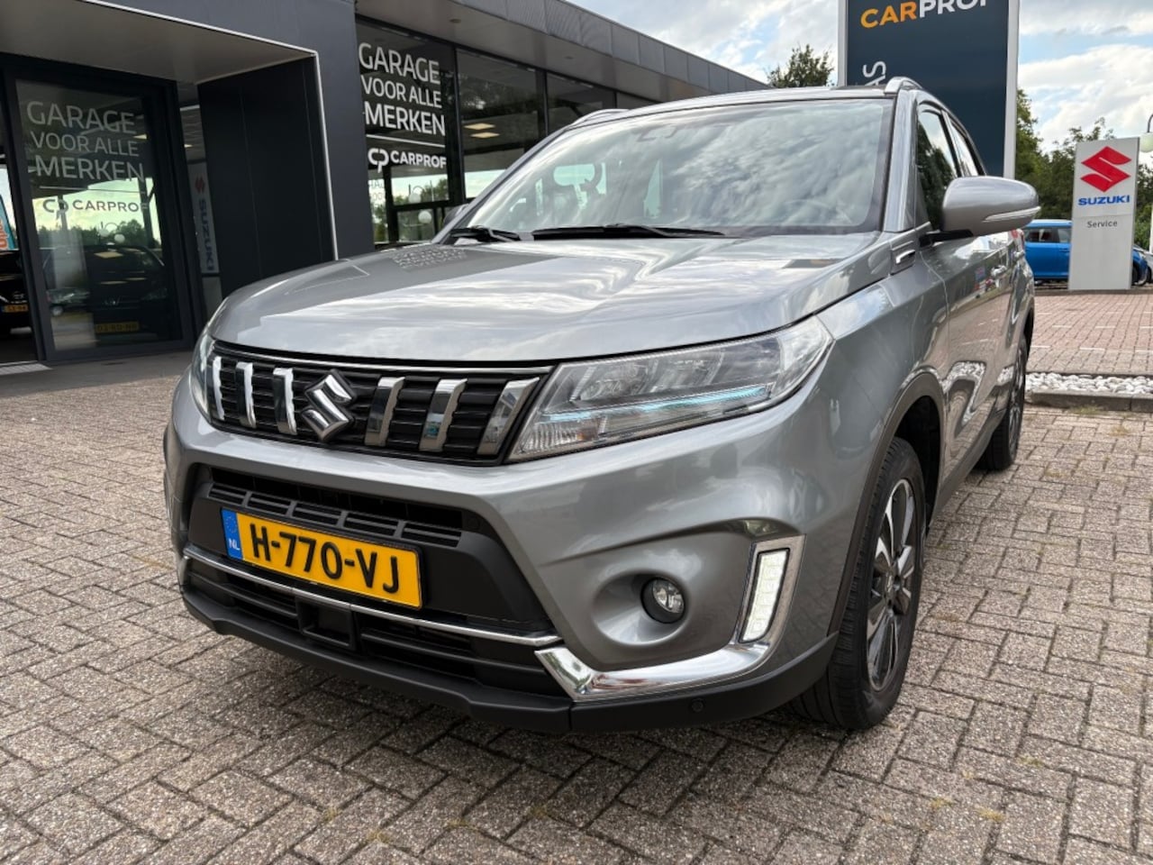 Suzuki Vitara - 1.4 Boosterjet Smart Hybrid Style ''Camera - Trekhaak - AutoWereld.nl