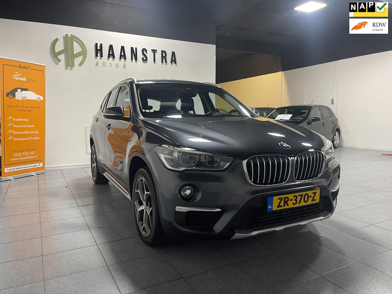 BMW X1 - SDrive20i High Executive Autom, Navi, 1e Eig, NL Auto! - AutoWereld.nl