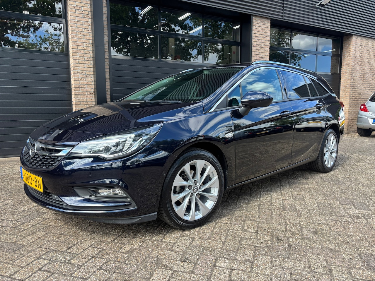 Opel Astra Sports Tourer - 1.4 Turbo Innovation Camera Trekhaak Automaat - AutoWereld.nl