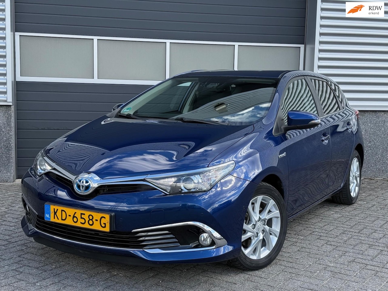 Toyota Auris - 1.8 Hybrid Executive Navi Camera - AutoWereld.nl