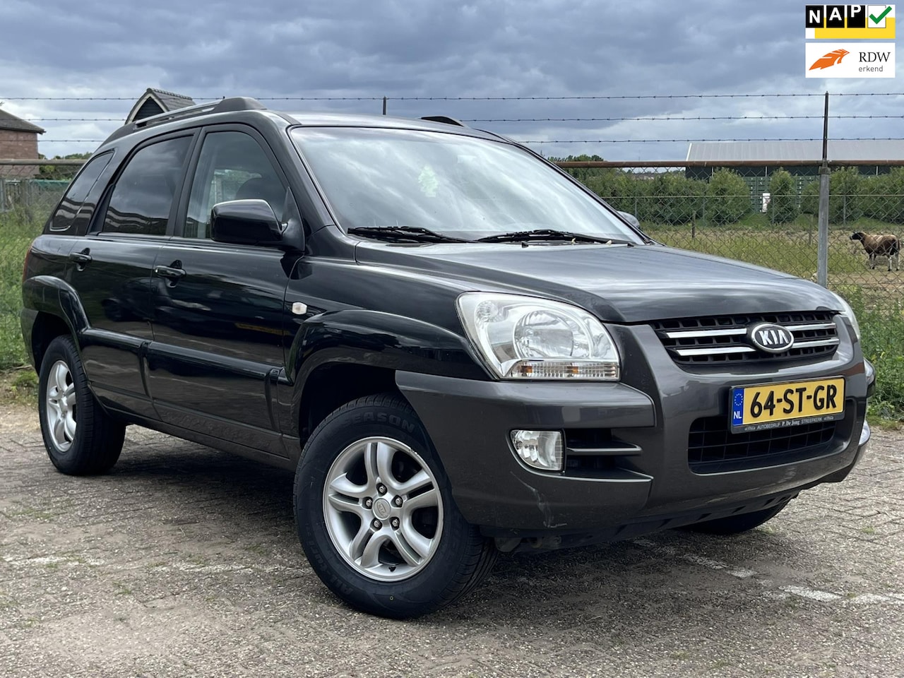 Kia Sportage - 2.0 CVVT AIRCO CRUISE TREKHAAK - AutoWereld.nl