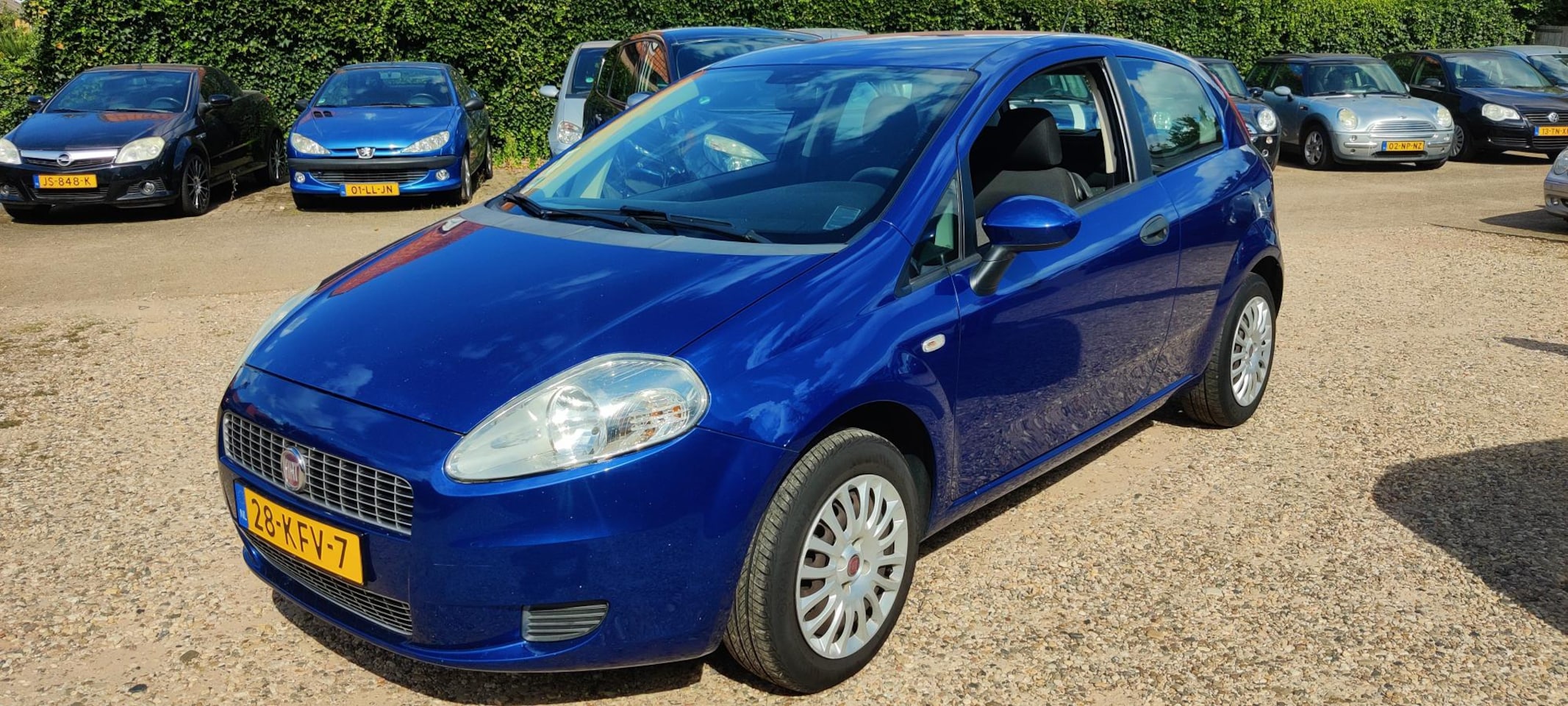 Fiat Punto Evo - 1.2 Active Radio via stuur te bedienen. - AutoWereld.nl