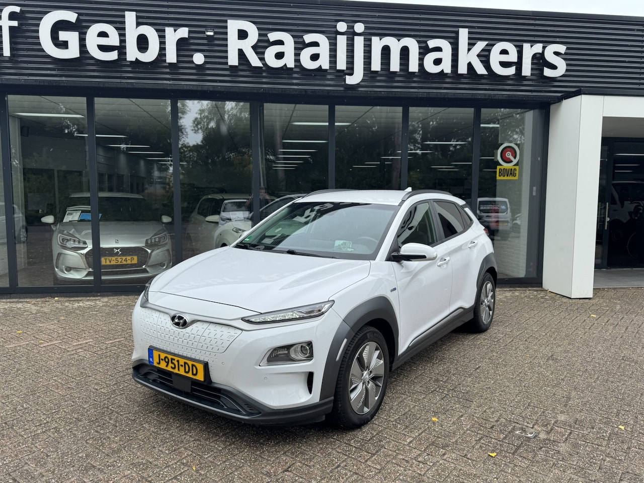Hyundai Kona Electric - EV Premium 64 kWh *Navigatie*Leder*ECC*EXPORTPRIJS* - AutoWereld.nl