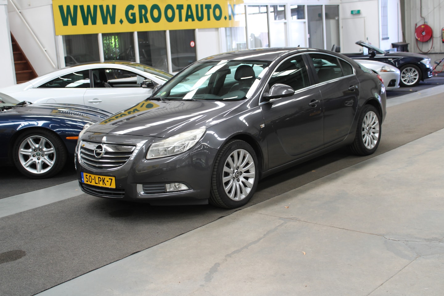Opel Insignia - 1.6 T Edition Airco, Cruise Control, Leder, Navigatie, Stuurbekrachtiging - AutoWereld.nl