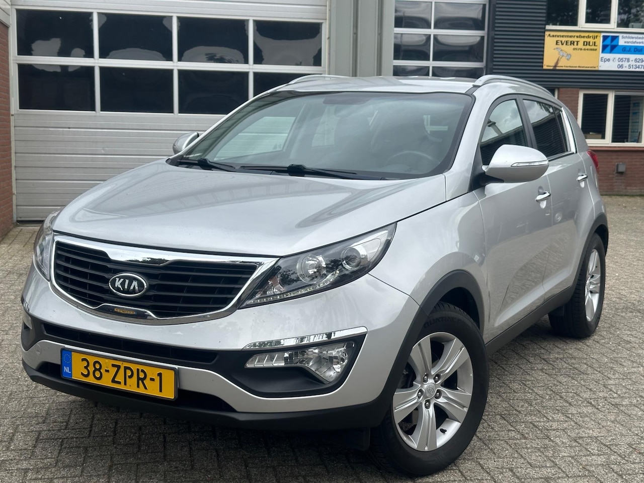 Kia Sportage - 2.0 X-ecutive Plus Pack Automaat/Navi - AutoWereld.nl