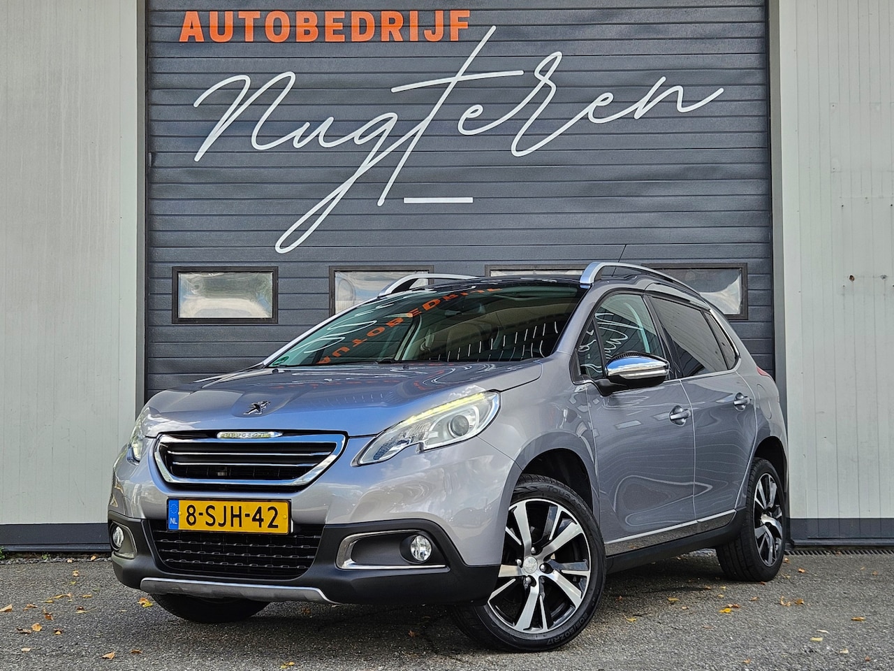 Peugeot 2008 - 1.6 VTi Féline|Pano|Leer|Navi|Grip control - AutoWereld.nl