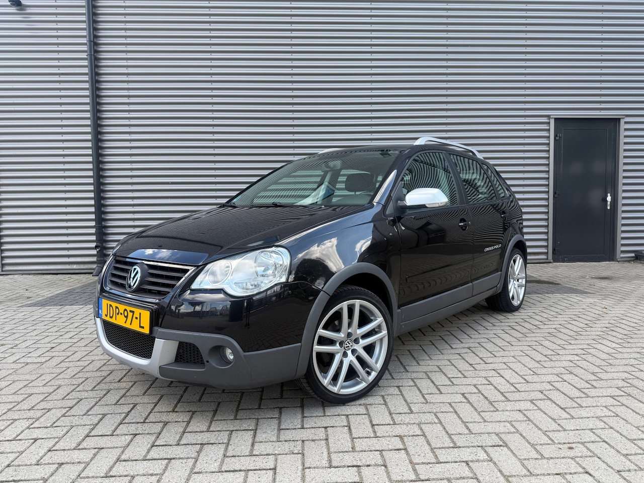 Volkswagen Polo - 1.4-16V Cross 5DRS / Airco / Zwart / 2009 / APK - AutoWereld.nl