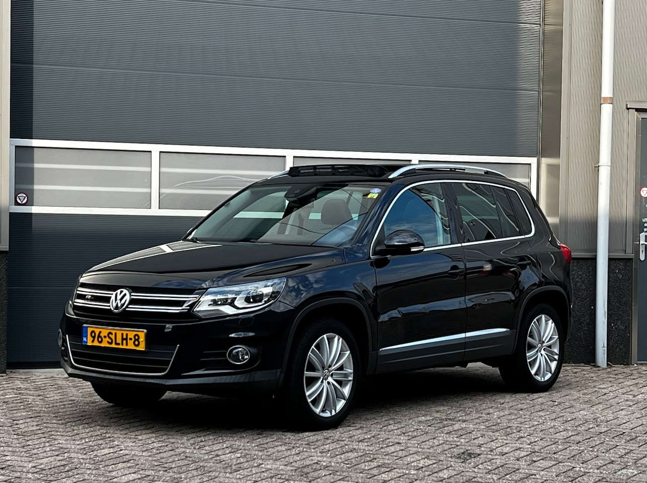 Volkswagen Tiguan - 1.4 TSI Sport&Style bj.2011 Pano|Camera|Nap. - AutoWereld.nl