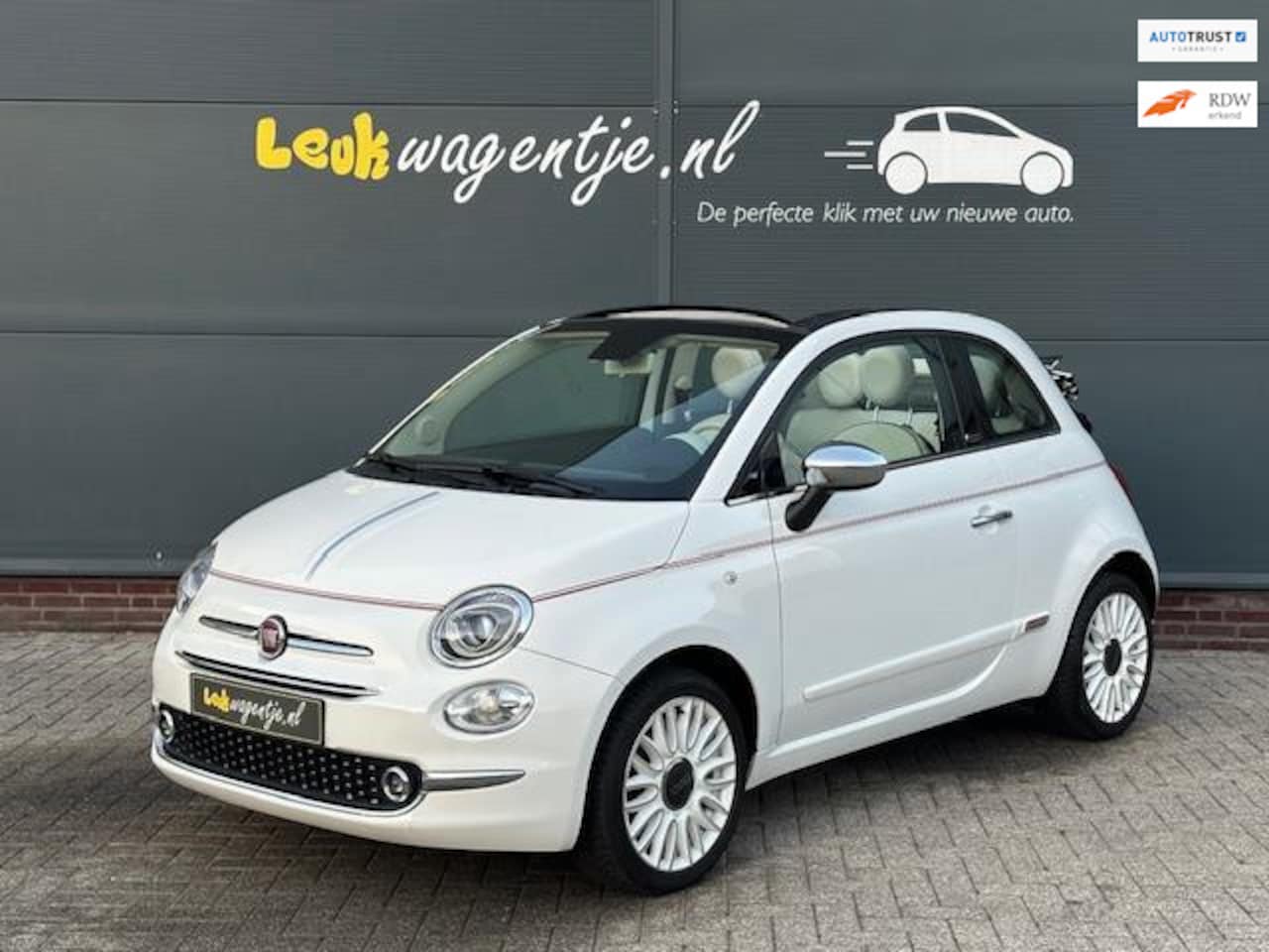 Fiat 500 C - 1.2 Dolcevita Cabrio *carplay *leder *unieke kap - AutoWereld.nl