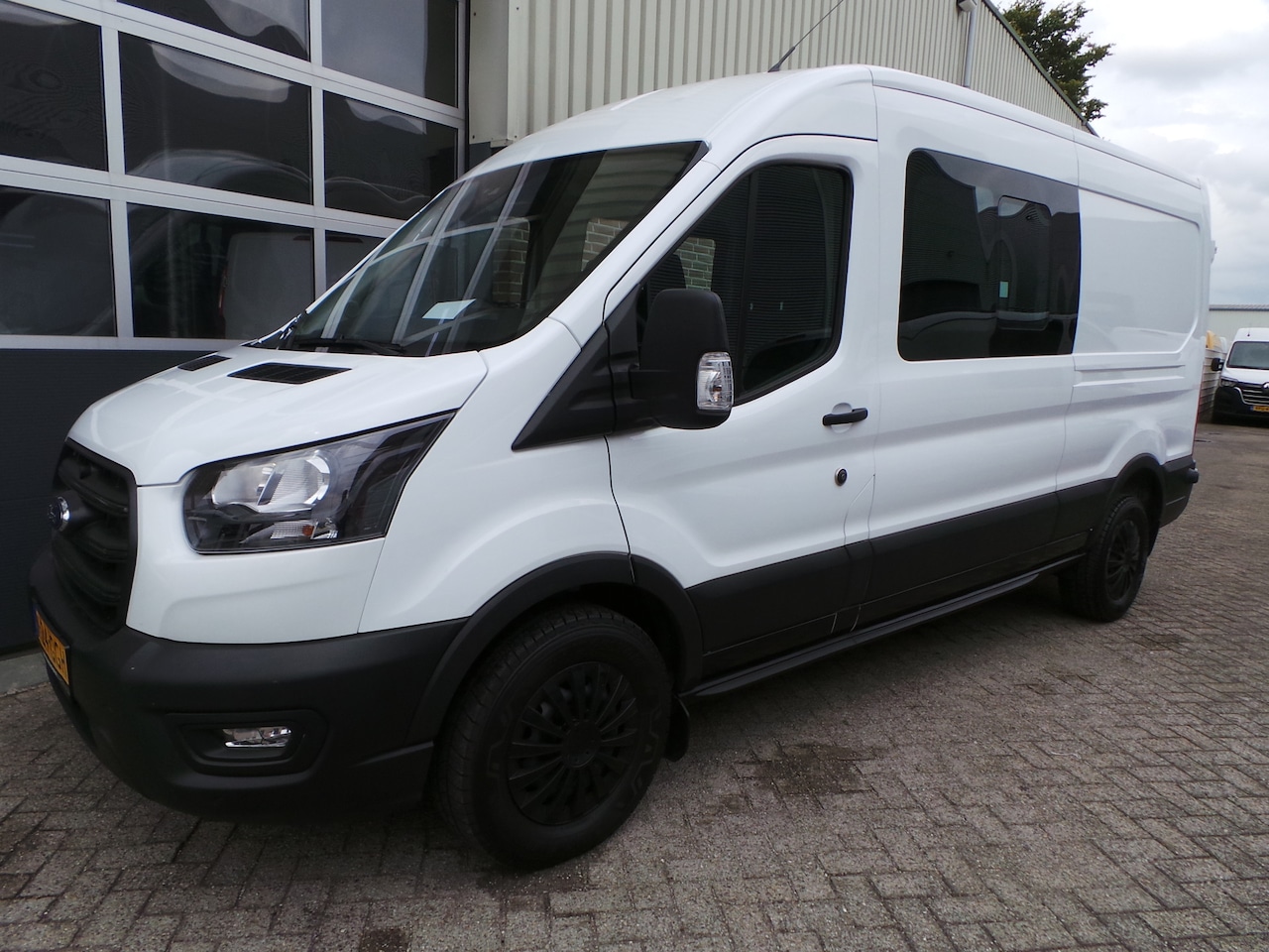 Ford Transit - 350 2.0 TDCI 130pk 7 persoons L3H2 DC Airco,Cruise,Pdc,Enz - AutoWereld.nl