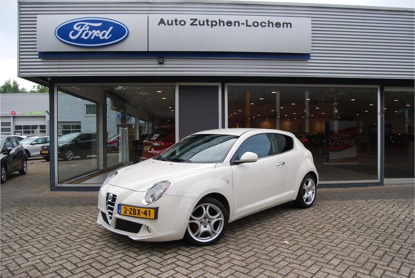Alfa Romeo MiTo - 0.9 TwinAir 100PK Esclusivo | LEDER | NAVI | CLIMATE | DNA | WINTERBANDEN - AutoWereld.nl