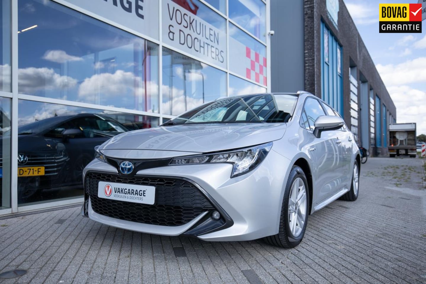 Toyota Corolla Touring Sports - 1.8 Hybrid Business | Navi | Carplay| Camera - AutoWereld.nl