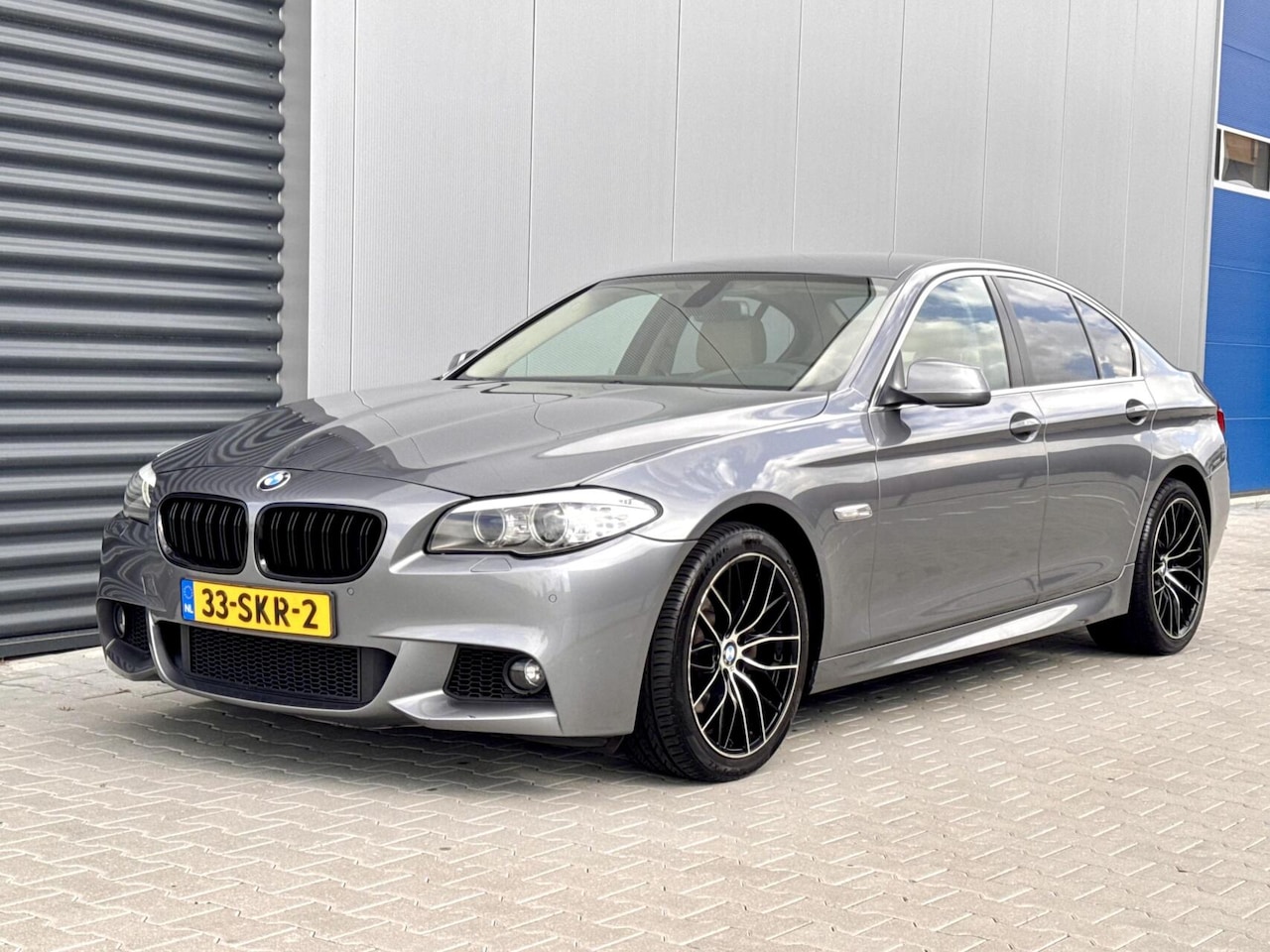 BMW 5-serie - 520i High Executive | M pakket | Xenon | Navi ! - AutoWereld.nl