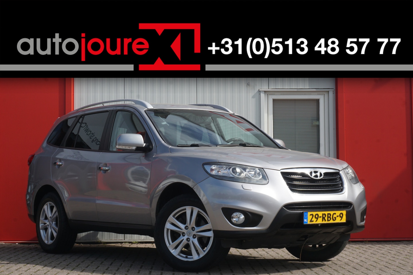 Hyundai Santa Fe - 2.4i CVVT Style 7 pers. | Origineel NL | Camera | Airco | Leder | Cruise Control | Trekhaa - AutoWereld.nl