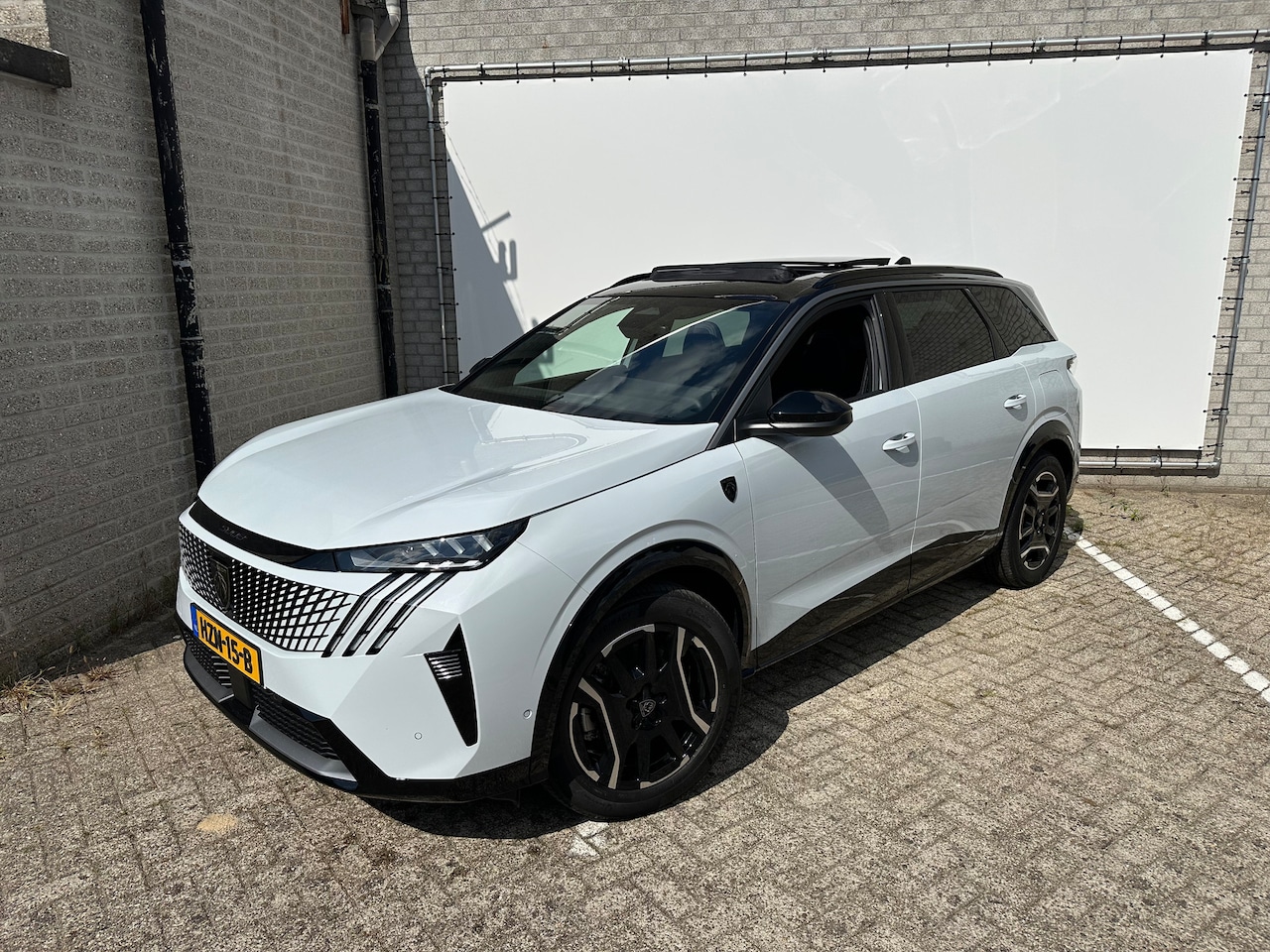 Peugeot e-5008 - GT Avantage 73 kWh 3-Fase | 2 stoelen op derde rij | Achterbank in delen neerklapbaar | Ac - AutoWereld.nl