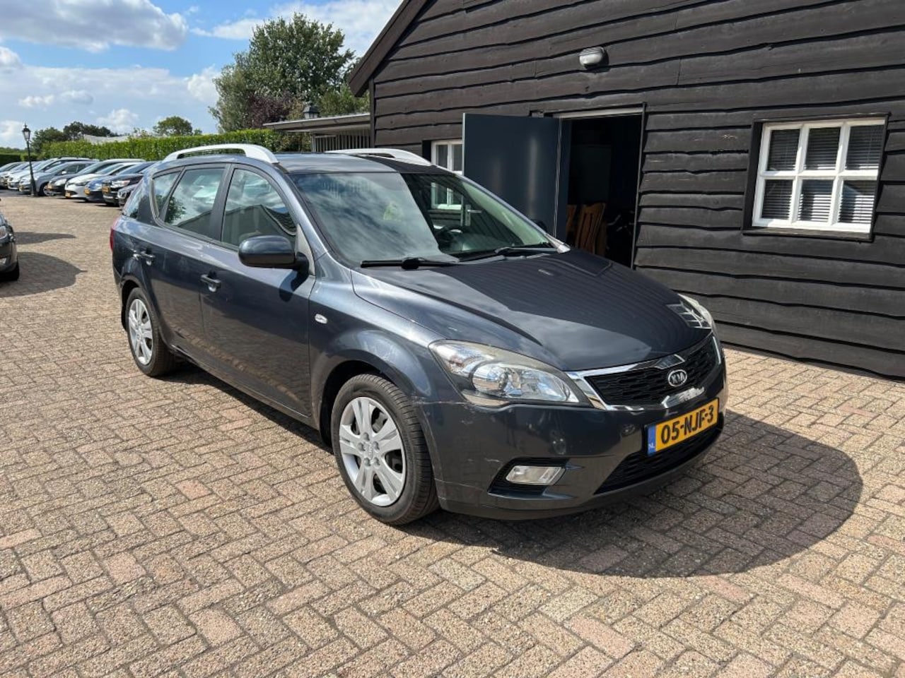 Kia Cee'd Sporty Wagon - 1.6 CVVT X-ecutive 1.6 CVVT X-ecutive - AutoWereld.nl
