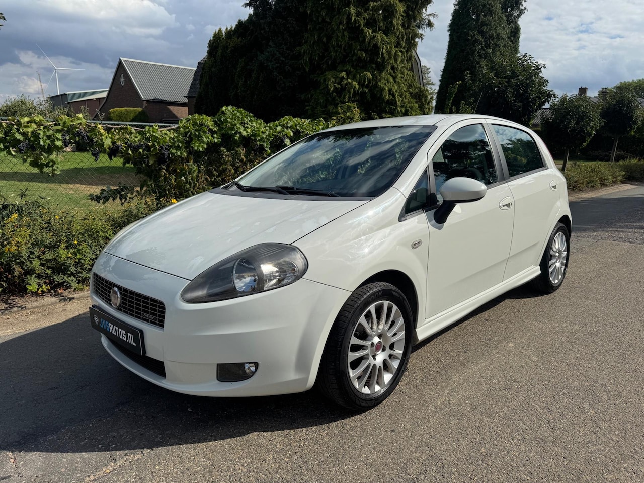 Fiat Grande Punto - 1.4-16V Racing AIRCO / TREKHAAK / 5 DEURS - AutoWereld.nl