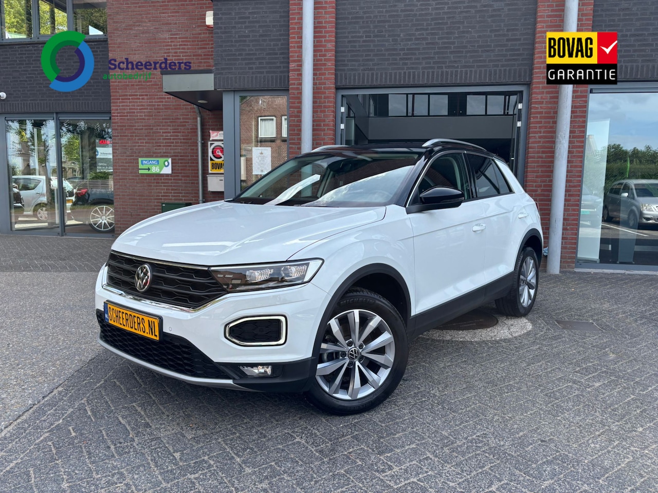 Volkswagen T-Roc - 1.5 TSI Style 1.5 TSI Style,Navi,PDC,Camera,1Jaar garantie - AutoWereld.nl