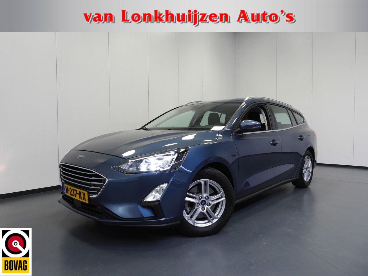 Ford Focus Wagon - 1.0 EcoBoost Trend Business NAVI/AIRCO/TREKHAAK/16"LMV! - AutoWereld.nl
