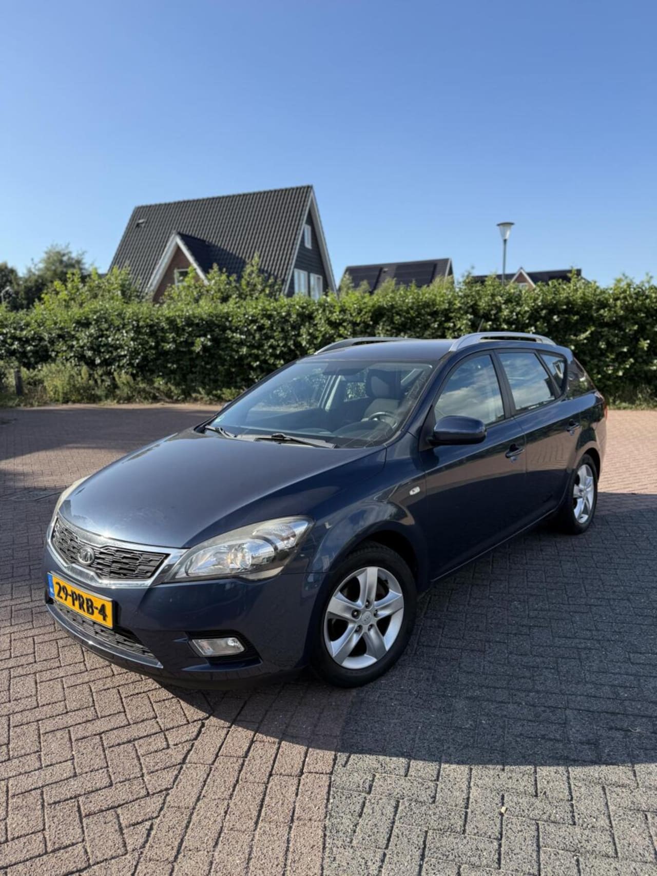 Kia Cee'd Sporty Wagon - 1.4 CVVT 2011 Camera/Navi/Trekhaak - AutoWereld.nl