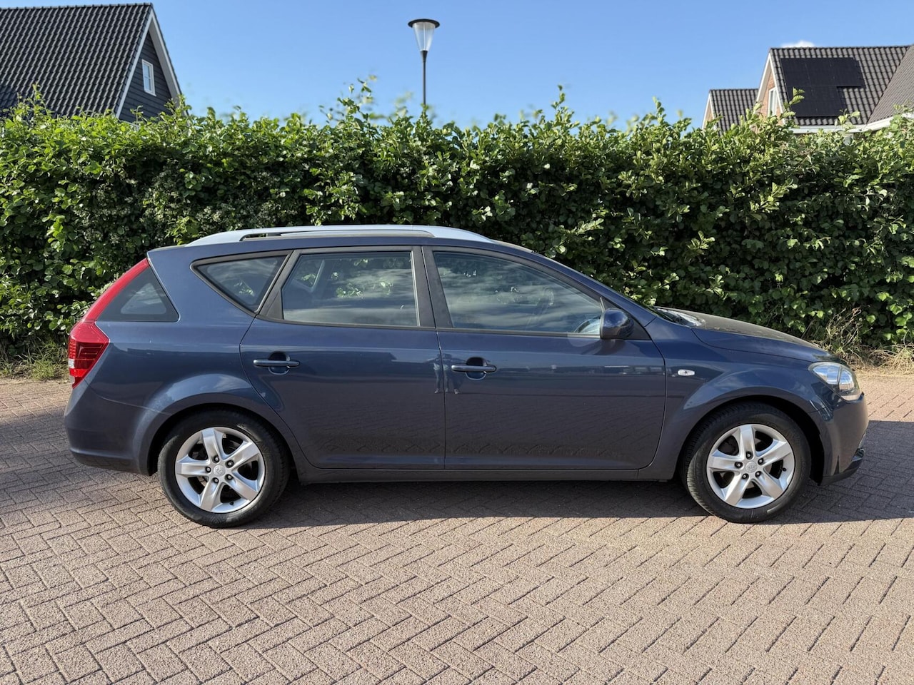 Kia Cee'd Sporty Wagon - 1.4 CVVT 2011 Camera/Navi/Trekhaak - AutoWereld.nl