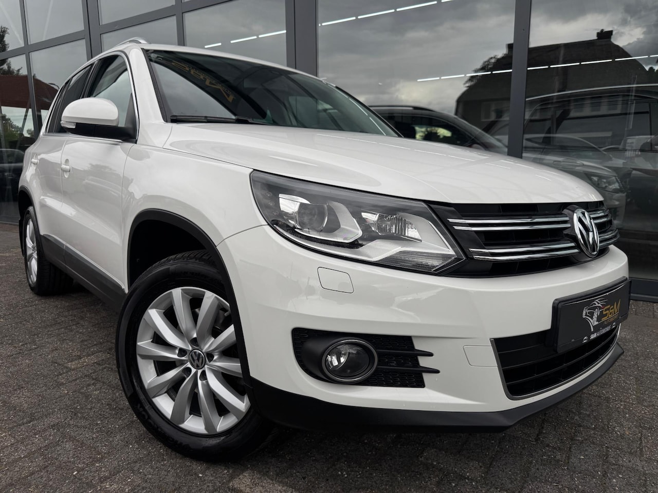 Volkswagen Tiguan - 2.0 TSI Sport&Style 4Motion | Pano. - AutoWereld.nl