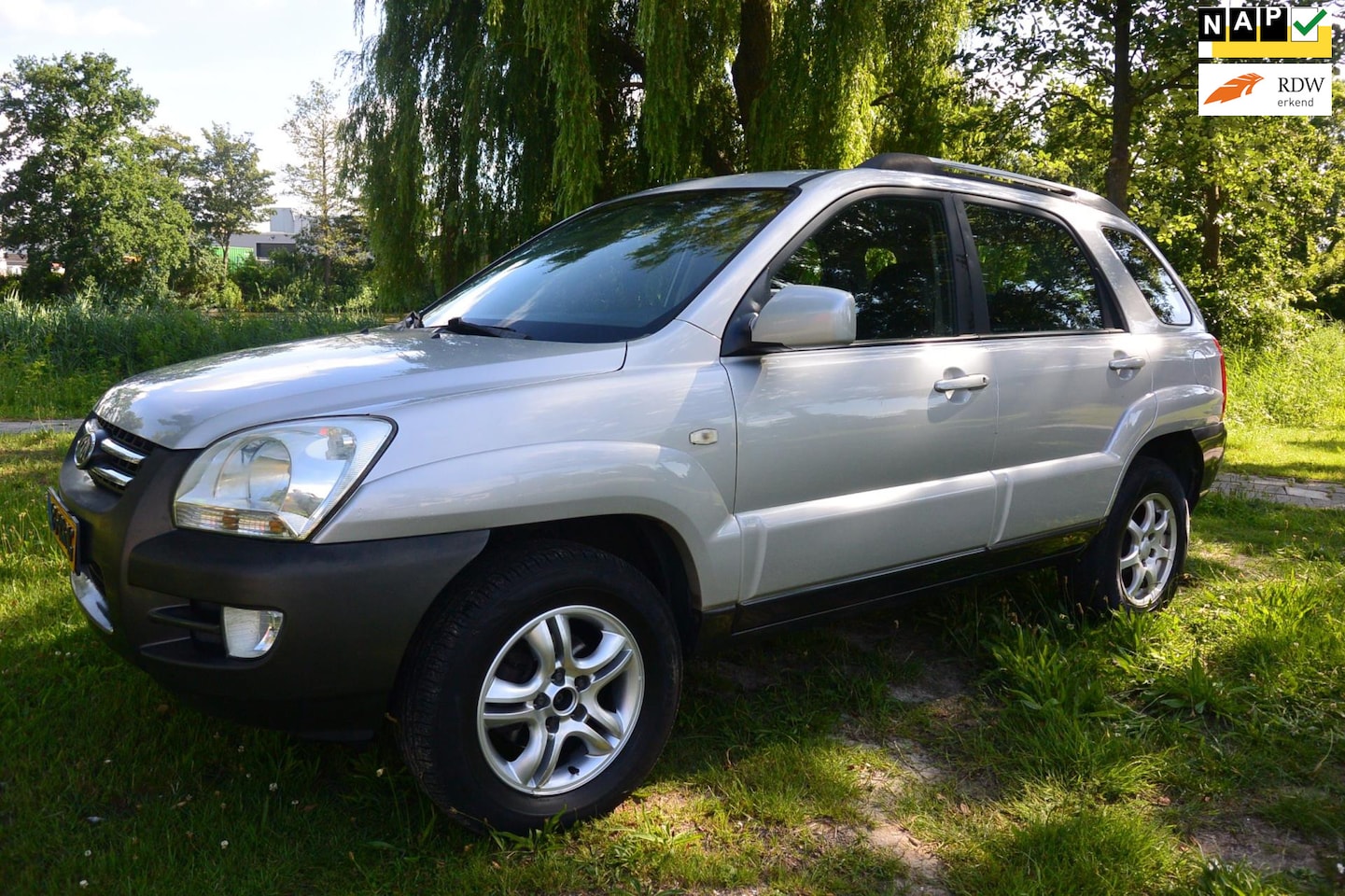 Kia Sportage - 2.0 CRDi Executive*airco*cruise*leer*trekhaak - AutoWereld.nl