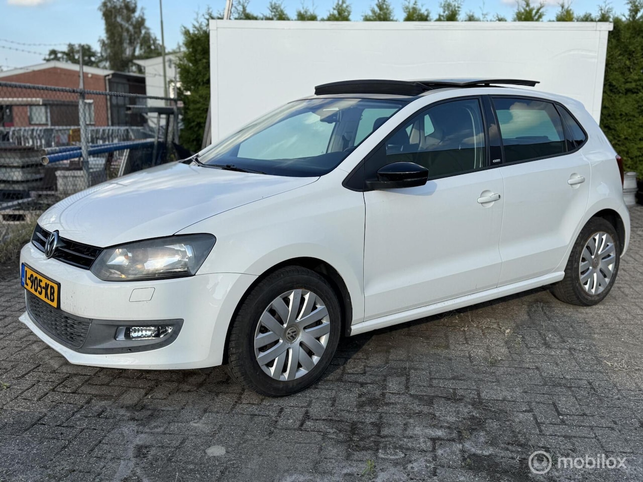 Volkswagen Polo - 1.2 STYLE panorama stoelverwarming - AutoWereld.nl