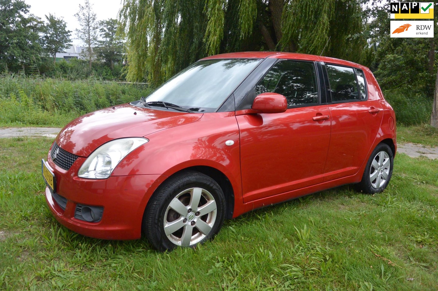 Suzuki Swift - 1.3 Shogun*5deurs*airco*2de eigenaar*isofix - AutoWereld.nl